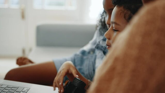 Staying connected during military deployment: Little boy talking to his deployed father on a video call