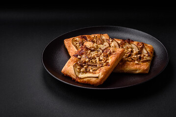 Delicious fresh sweet pie or pizza with pear, brie cheese, honey and nuts
