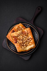 Delicious fresh sweet pie or pizza with pear, brie cheese, honey and nuts