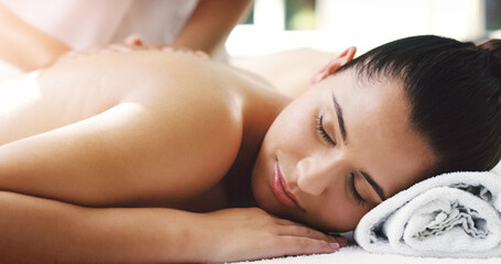Obraz na płótnie Canvas Woman, relax and sleeping in back massage at spa for healthy wellness, skincare or stress relief at a resort. Calm female person relaxing asleep in peaceful zen or luxury body treatment at the salon
