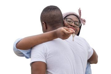 Woman hugging man and holding the home key