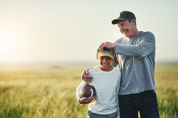 Father, kid smile and rugby ball in a countryside field for bonding and fun in nature. Mockup, dad...