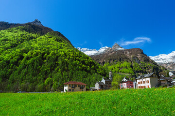 Fototapeta na wymiar The small characteristic village of Sonogno, the highest town of Val Verzasca, in Canton Ticino, Switzerland - May 2023