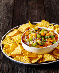 summer fruit salsa with tortilla chips on plate