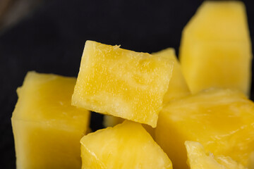 Sliced delicious ripe pineapple yellow, close up
