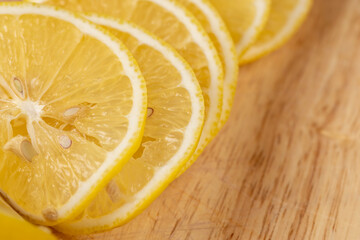 Yellow ripe lemon cut into slices