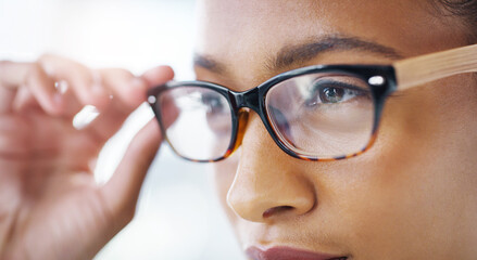 Woman, closeup of glasses and vision with eye care, prescription lens and frame with optometry and...
