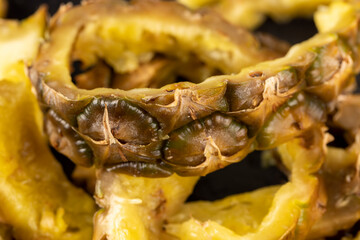 green-yellow peel of ripe pineapple close-up