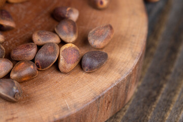 a bunch of pine nuts in the shell