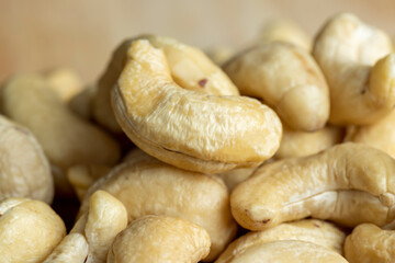 scattered pile of cashew nuts