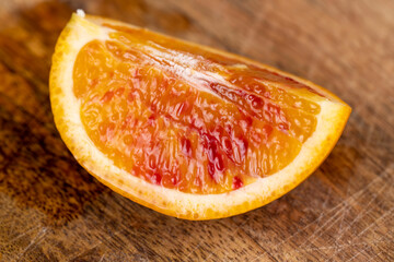 sliced orange with yellow-red juicy flesh