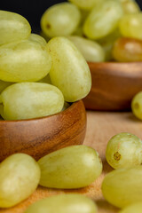 Ripe green grapes on the kitchen table