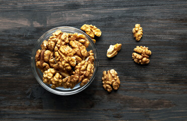 Walnut in bowl on a wood