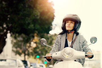 Woman, motorcycle and transport in city, street and safety with helmet, journey and travel with...