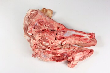 Half a raw pig's head. Pig's head chopped off - obrazy, fototapety, plakaty