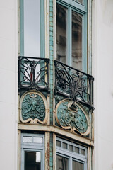 Close-up of the façade of an Art Nouveau building in Saint-Étienne