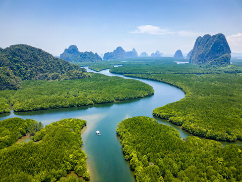 Drone view of the mangrove forests and towering limestone pinnacles and karst landscape of Phangnga Bay, Thailand