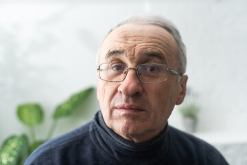 Smiling senior man with eyeglasses