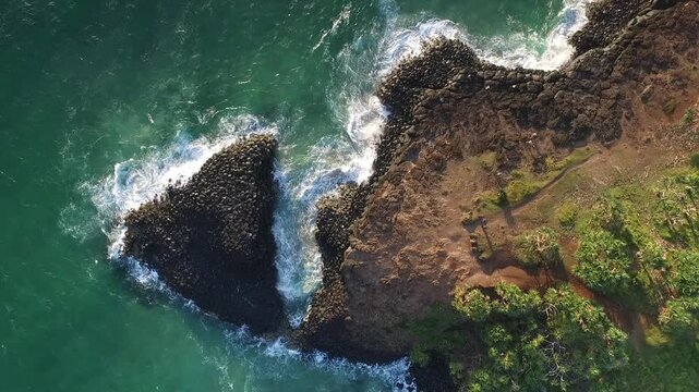 Aerial top down view, with a zoom out over Giant's causeway at Fingal head. 