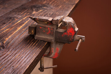A vise on a carpenter's workbench.