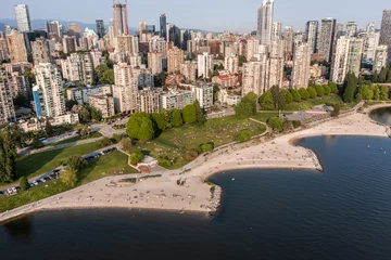 Aerial view of area around Sunset Beach Park at False Creek in Vancouver, Canada with people on the sunset beach, Vancouver skyline in the background © Mario Hagen