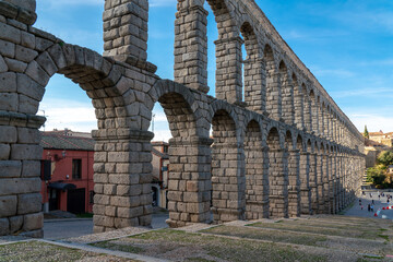 Fototapeta na wymiar Aqueduct of Segovia - SPAIN. Was built during the second half of the 1st century A.D. under the rule of the Roman Empire and supplied water from the Frío River to the city center. Travel destination