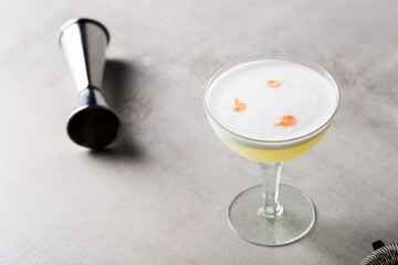 Pisco Sour Cocktail booze pisco, fresh lemon juice, syrup, egg white and aromatic bitters