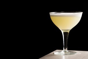 Pisco Sour Cocktail booze pisco, fresh lemon juice, syrup, egg white and aromatic bitters