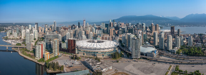 Obraz na płótnie Canvas Vancouver, BC, Canada, aerial panoramic city view of famous False Creek in Vancouver downtown with Cambie Bridge and BC Place Stadium in front and Vancouver Skyline in the background 