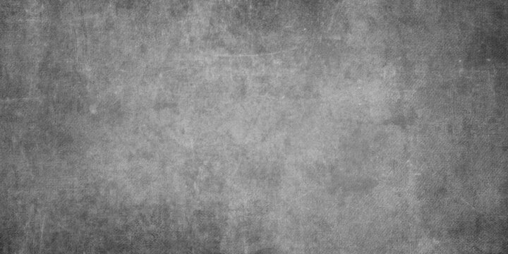 Abstract monochrome old and distressed grainy and spotted grunge texture with scratches, white and grey vintage seamless old concrete floor grunge background used as wallpaper and construction.