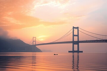 Fototapeta na wymiar Dawn's Embrace: A Large Suspension Bridge Spanning Calm Seas at Sunrise - AI Generative