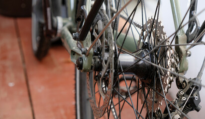 Rear wheel. Sprocket for shifting gear on the bicycle. Bicycle repair.