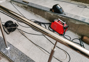 installation of railings and stairs. Installation using wire. Reconstruction of reinforced concrete...