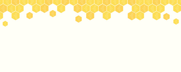 Beehive honey sign with hexagon grid cells on yellow background.