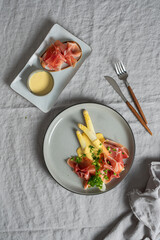 steamed white asparagus with Serrano ham and hollandaise