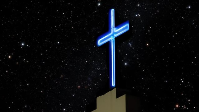 Catholic Cross Against Starry Sky, Caacupe Church in the Villa 21-24 Slum, where archbishop Jorge Mario Bergoglio, now Pope Francis, used to perform Charity Work, Buenos Aires, Argentina.