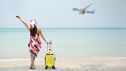 Summer Party. Traveler and tourism woman travel in summer on the beach and white sand. Asian relax with suitcase Happy and enjoyed for travel with plane and outdoor.on Summer Vacation