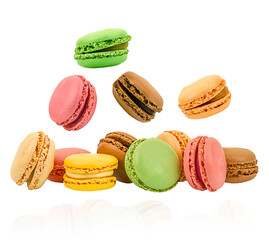 French macaroons  isolated on a transparent background. Colorful macaroons flying 
