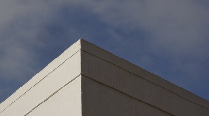 corner of building against blue sky