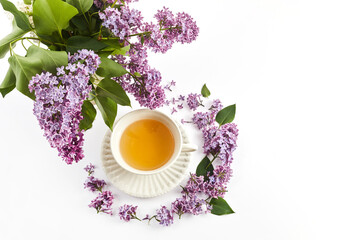 herbal tea with lilac flowers, view from above,