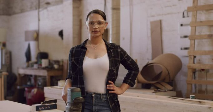 Wood, Carpenter And Portrait Of A Woman With A Sander In A Workshop For Manufacturing Pride. Female Entrepreneur Sanding For Creative Furniture Project, Design And Production At Carpentry Factory