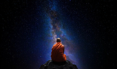 Fototapeta na wymiar Buddhist monk looking at the universe. AI generative