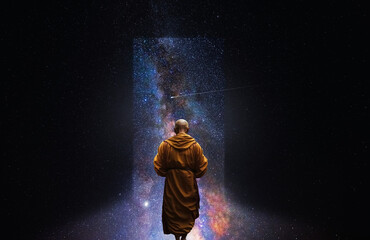 Buddhist monk looking at the universe. AI generative
