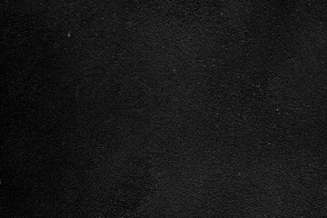 Empty black concrete stone surface texture. It's dark background.