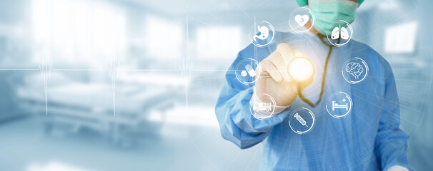 Medicine doctor holds a stethoscope in hand and examines various medical network icons connected through a modern virtual interface technology.
