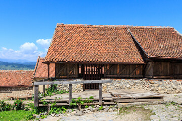 Fototapeta na wymiar Historical buildings on the territory of the Rasnov Citadel. Transylvania. Romania