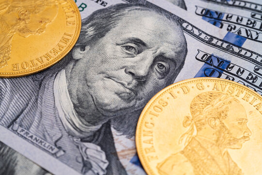 Austrian four ducats on US dollars. Investments in investment coins. The concept of buying gold. investment in gold.