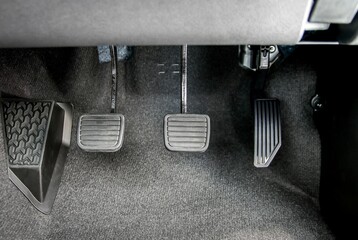 Accelerator, brake pedal and clutch pedal of manual gear car - obrazy, fototapety, plakaty