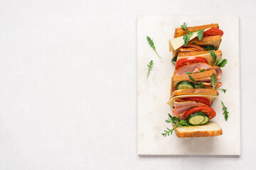 Club sandwich on white background top view with copy space. Healthy snack, fast food