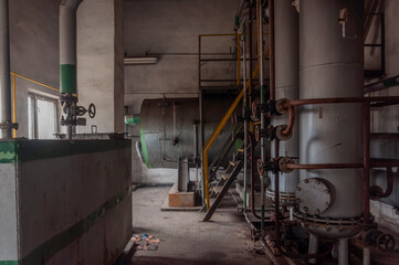 Exploring the Enigmatic Beauty of an Abandoned, Historic Boiler Room: Unveiling the Secrets of a Forgotten Architectural Gem